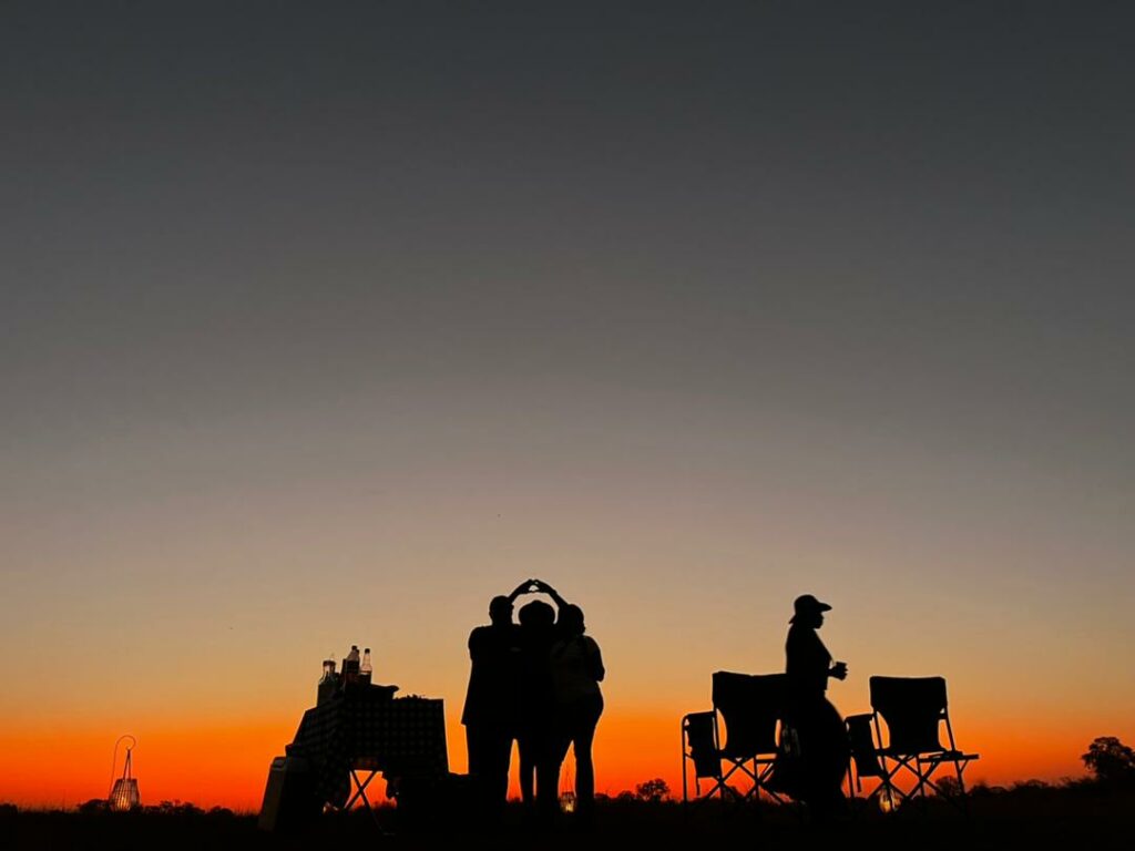 Sundowners at Khwai Expeditions Camp